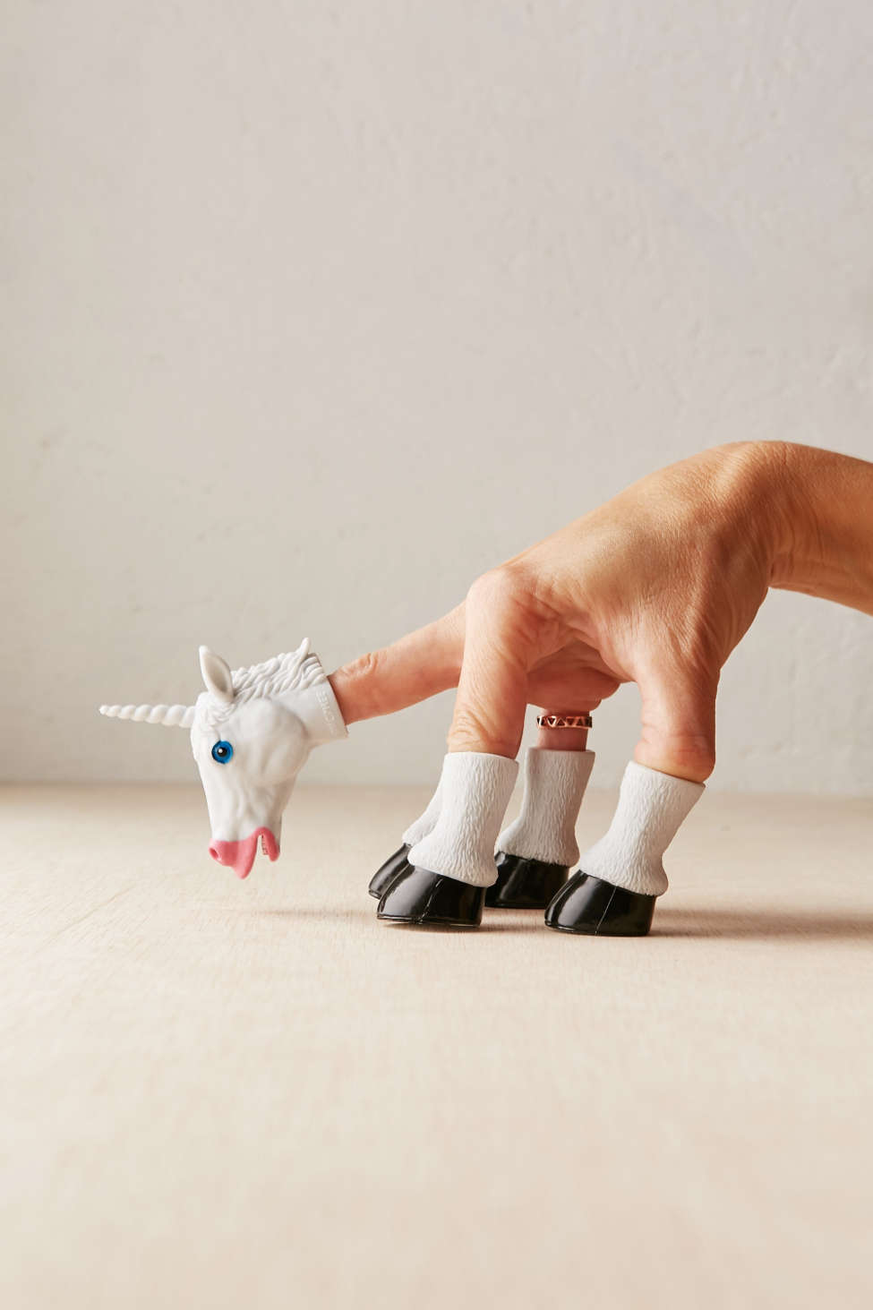 Funny unicorn puppet for the fingers