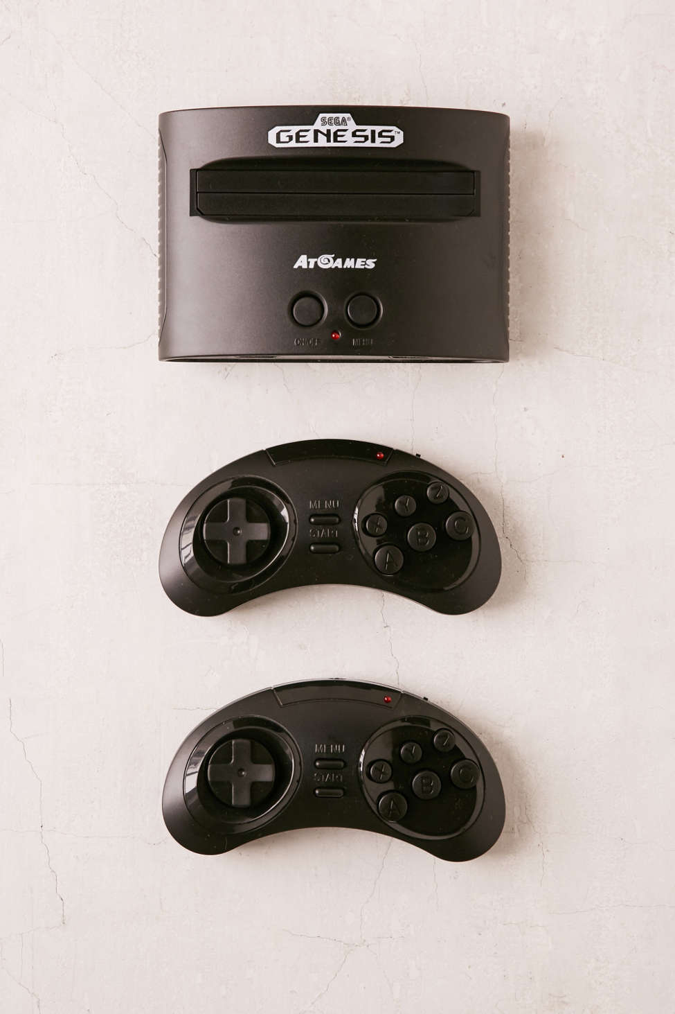 Sega Genesis game system and two conrollers