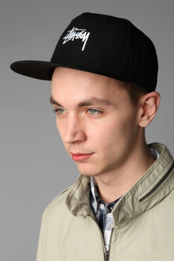 Stussy Script Stock Snapback Cap | Urban Outfitters