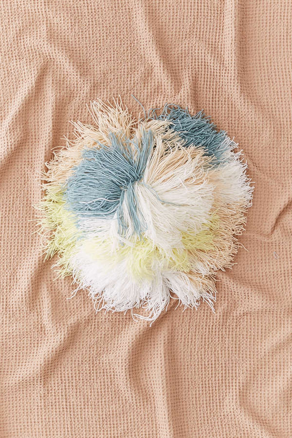 Slide View: 1: Round Shaggy Pastel Pillow
