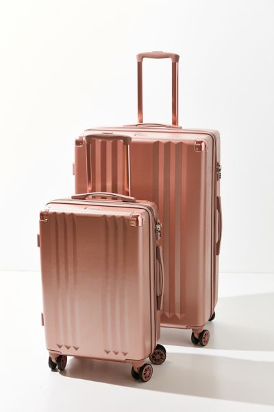 calpak mint green luggage