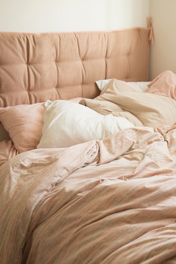 Convertible Flannel Headboard Pillow | Urban Outfitters