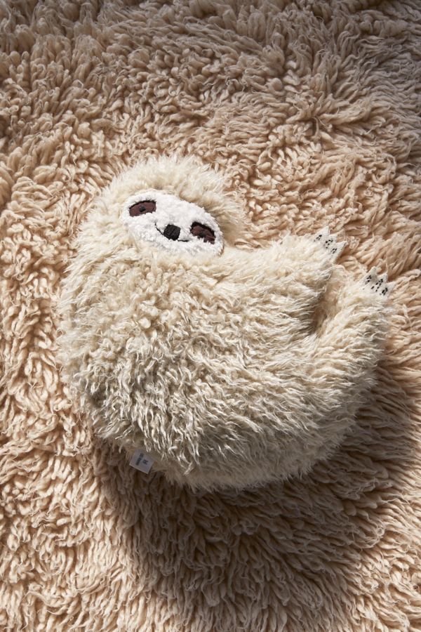 Furry sloth pillow