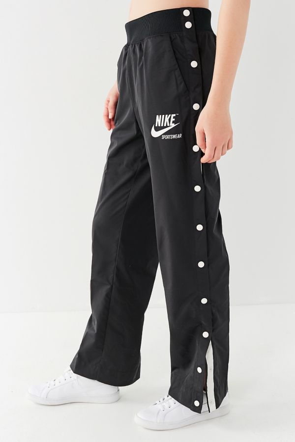 nike sportswear all over print track pants