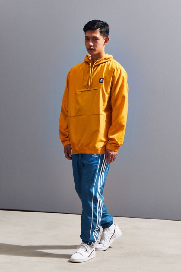 adidas hip packable jacket yellow