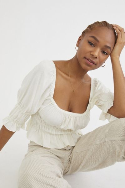 Urban Outfitters Uo Kate Smocked Ruffle Blouse In Ivory
